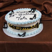 Clarinet Musical instrument made out of fondant and painted with food coloring.