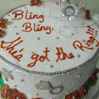 Bling, Bling Had fun with this one! The ring on top is a toy ring that lights up, the rest of them are fondant and painted silver, the edge is made of...