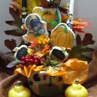 Thanksgiving Cookie Bouquet Cut out the cookies with a knife using a pattern. Designs are edible images.