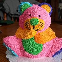 Kitty This is a pattern of a Beanie baby kitty that was the young lady's favorite toy. It is the wilton bear pan with buttercream stars...