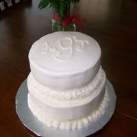 My First Wedding Cake! My first wedding cake just happened to be my second paid cake. This looked better in person, the camera accentuated the flaws in the...