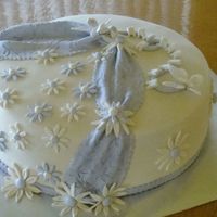 Teething Cake fondant cake to celebrate baby's first toothcouldn't think of any ideas for that occasion so i put the butterflies as if they&#...