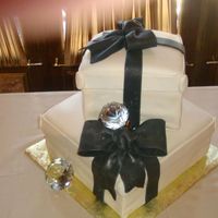 Forever Diamonds all fondant cake for a bridal shower with a diamond jewels on it and gumpaste bows