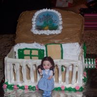 Wizard Of Oz - Dorothy's House My daught was a huge Wizard of Oz fan. The pattern for this cake was actually a doll house cake. It is a little out of proportion, but she...