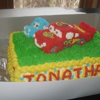 Cars Cake Picture 1 Of 3 I made this cake using this website for direction. Sally and McQueen were made by carving yellow cake made from loaf pan. I used aluminum...