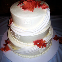 Autumn Elegance 9"-11"-13" French Vanilla w/ buttercreamswags and leaves are gumpaste