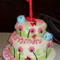 First Birthday 10" carrot cake with cream cheese frosting and 7" gluten free carrot cake with cc frosting. All decorations are made out of...