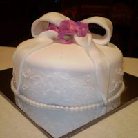 Birthday Cake With Bow And Sweet Peas sweet peas made from flower paste, and bow from fondant dusted with luster