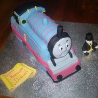 Thomas The Tank Engine & Sir Topman Hat ( Still The Fat Controller To Me ) Chocolate mudcake, a lot of hours work put into this cake I have learnt a lot from this cake, and know where i went wrong, I also learnt i...