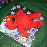 Elmo On A Pillow I made this cake for my sons second birthday, white mud cake body, chocolate mud cake for his arms and legs, butter cake for his head, the...