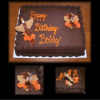 Pheasants This is a yellow cake with chocolate Dreamwhip Buttercream. The pheasants and leaves are made of MMF. Thanks for looking!