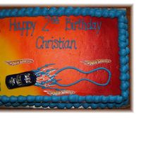 Hotwheels Cake This is a vanilla 1/4 sheet cake with buttercream. The "Hotwheels" signs I printed out, laminated, cut them out and placed on the...