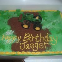 John Deere Birthday The green is sprayed on. The "dirt" is crushed Teddy Grahams. The tractor is just a toy mom bought to sit on top. We "drove&...