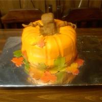 Pumpkin Cake Spice cake with cream cheese frosting with rice crispy treats stem covered in MMF and leaves are also MMF. Thax for looking