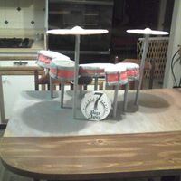 Drumset From The Front Here is the front view of the drumset cake. 7 Days Away is the name of his band