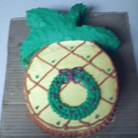 Hawaiian Christmas Cake This is a cake I made for our staff Christmas Party. The party theme was An Hawaiian Christmas. It is pineapple cake with buttercream.