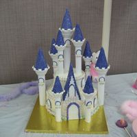 Img_0353.jpg Wilton Castle Cake from the 08 Yearbook...this is my daughter's firest birthday cake and it took me just over 13 hours total from...