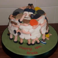 Rugby Cake just managed to salvage this. it was supposed to be a 3D rugby ball cake which went horribly wrong hence they ended up with players in a...