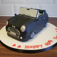 Mini Cooper Cake this was my second try at a carved car cake. this one came out so much better than the first. it took me about 17 hours to get this done, i...