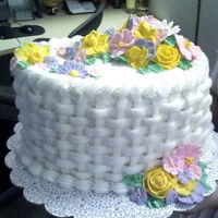 Flower Basket This is the final cake for Wilton II. We spent 3 wks learning different flowers made with Royal Icing and this cake displays all of them...