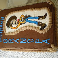 Woody Birthday Cake Vanilla cake with buttercream frosting and transfer. My son would call call his granpa "Woody" because he looked just like him.