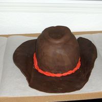 Cowboy Hat This is a basic yellow cake with brown fondant for the rim and top. It dried perfect and looked like leather! I wish I would have had the...