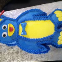 Pablo! Buttercream with fondant bow, beak, and spinner on hat. Thanks for looking.