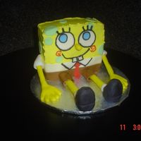 Spongebob Practice Cake Made this cake to try what i've seen here on CC. I think i'll make him taller next time and maybe cover him in fondant. My kids...