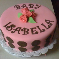 Baby Shower Cake Strawberry cake w/ cream cheese filling, covered in fondant and chocolate fondant polka dots. Roses and other accents are fondant as well....