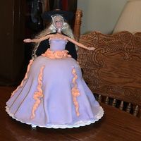 Halloween Barbie Cake A Barbie cake that I made for my daugther's birthday. Her birthday is in October close to Halloween, so I decided to make her a witch...