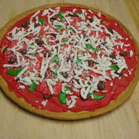 Pizza Cookie Sugar cookie crust, buttercream tomato paste and sausages, MMF mushrooms, peppers and peperoni, MMF mozzarella cheeze, white almond bark...