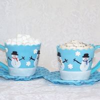 Cupcake Mugs Jumbo (approx 4") chocolate cupcakes covered in fondant and topped with marshmallows or buttercream "whipped cream." TFL
