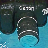 Camera Cake Dark chocolate cake with chocolate ganache filling. First attempt at a camera cake and I was pretty happy with the outcome. Client loved it...