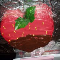 Chocolate Dipped Strawberry Strawberry cake baked in a heart shaped pan with red, yellow, and chocolate candy melts. This was for my daughter's third birthday!...