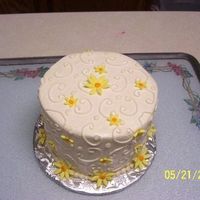 Yellow Daisies This is another special occasion cake that I did for my parent's bed and breakfast guests. It is in buttercream with fondant daisies,...
