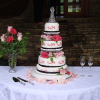 Black, White, And "watermelon" Red Wedding Cake The red was actually matched to the bride's maid's dresses. The columns were originally 6" to make the cake taller. But the...