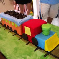 Fondant 3D Train 3D train covered in fondant, dark chocolate cookies for wheels and coal