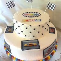 Nascar Car 29 Cake Two tier BC iced cake. Pictures are printed on icing sheet. Border and "quilting" done in BC. Flags are plastic decorations.
