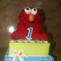 3D Elmo Birthday Cake BC covered 3D cake Elmo on top of 8" and 10" square cakes in BC. For a baby's 1st birthday. The Elmo was carved from the 3D...