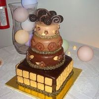 Cookies And Chocolate I made this cake for a benefit dinner for a friend of mine who has cancer. This one is similar to one done by Chef Duff (of course his is...