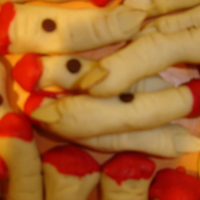 Witch's Fingers buttercookie, dipped in red candy melts.
