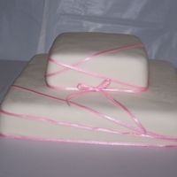 Callie Top tier is chocolate and the bottom is white. MMF with real pink ribbon. This one was fun to make. Honest opinions please.