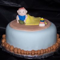 Baby Jeshua This was done to celebrate a baby turning six months old. White cake and everything else is MMF. Had alot of fun making this one. Honest...