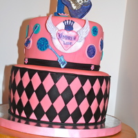 1St Birthday Cake. Cake designed to match napkins. It had trinkets on it like stars, crowns, guitars, peace signs, etc...and had hot pink, purple teal and...
