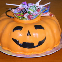 Pumpkin Cake Daughter wanted a jack-o-lantern for her birthday cake...she like it. Everyone kept asking where the cake was, they couldn't believe...