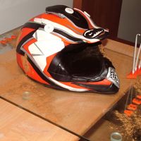Dirty Bike Helmet This cake was a real challenge for the boys mum deseperatly wanted a 3D dirty bike helmet just like her year old son used in competition. I...