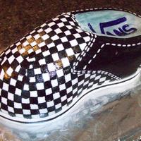 Van Shoe Carved the cake and covered it in fondant. I painted it with edible paint. I has a few issues, but overall I was pleased.