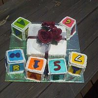 Baby Shower Blocks Made for my daughter's baby shower today. Butter Yellow mix with all BC icing and air brushed blocks.