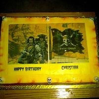 Pirates Of The Carribean Made for a friends grandsons Bday, a big fan of Pirates! Two 1/4 sheets, white and chocolate, BC icing, airbrushed color and edible image...