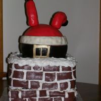 Santa Stuck In Chimney Saw this cake on CC and trpwife606 and I had to attempt it. Should have used supports. At least it was only for my family and they loved it...